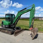 Mini-Pelle BOBCAT E55 d’Occasion – 5,7T (2012) Révisée avec 3 Godets